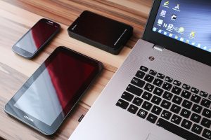 Computer, tablet and smartphone on a table