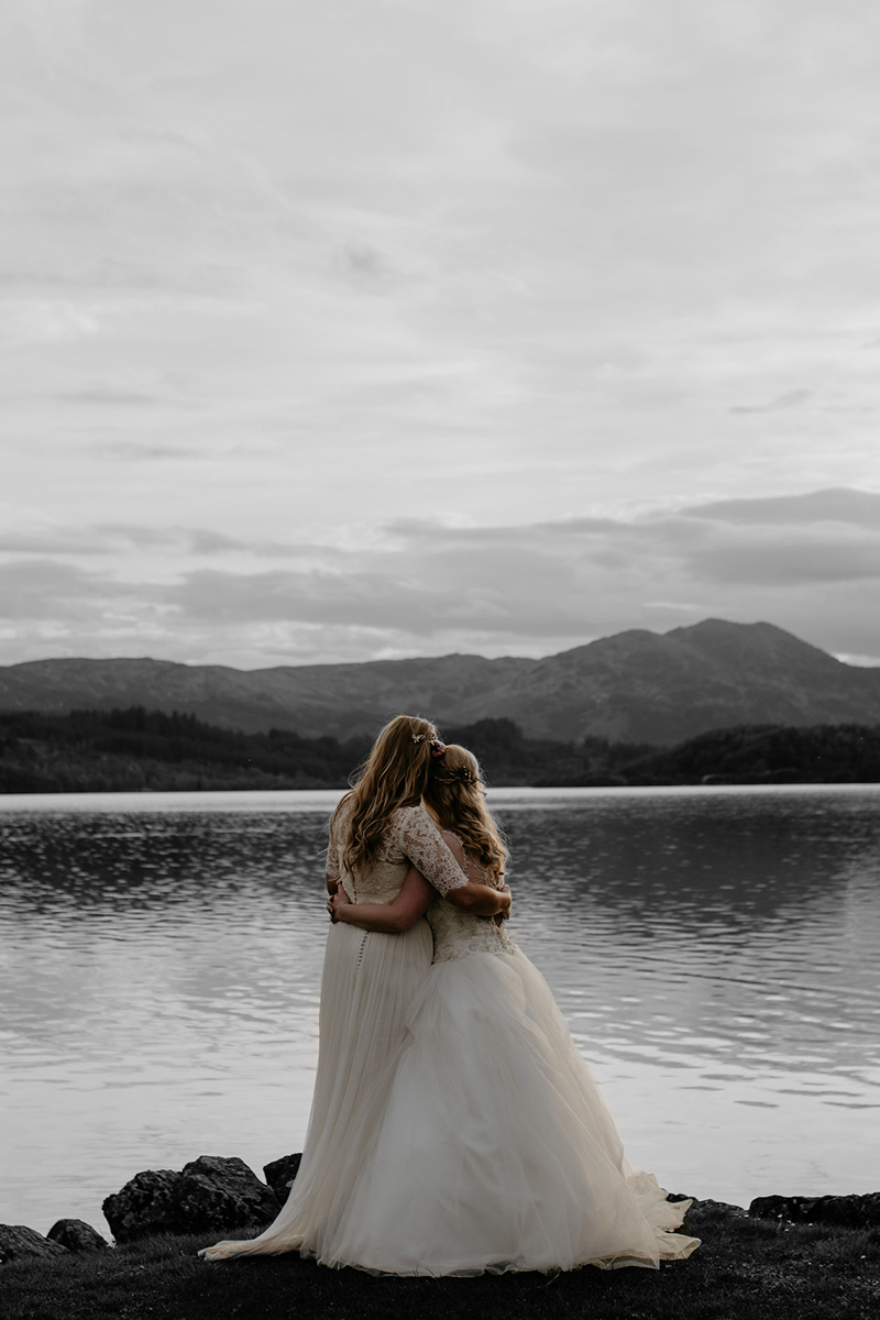 Two brides at their wedding at Venachar Lochside