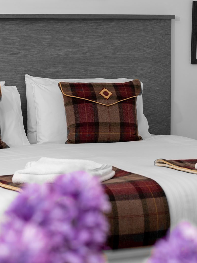 A bedroom at Elderburn Luxury Lodges