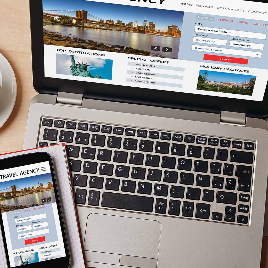 A website on a laptop and mobile phone showing the same travel page. 